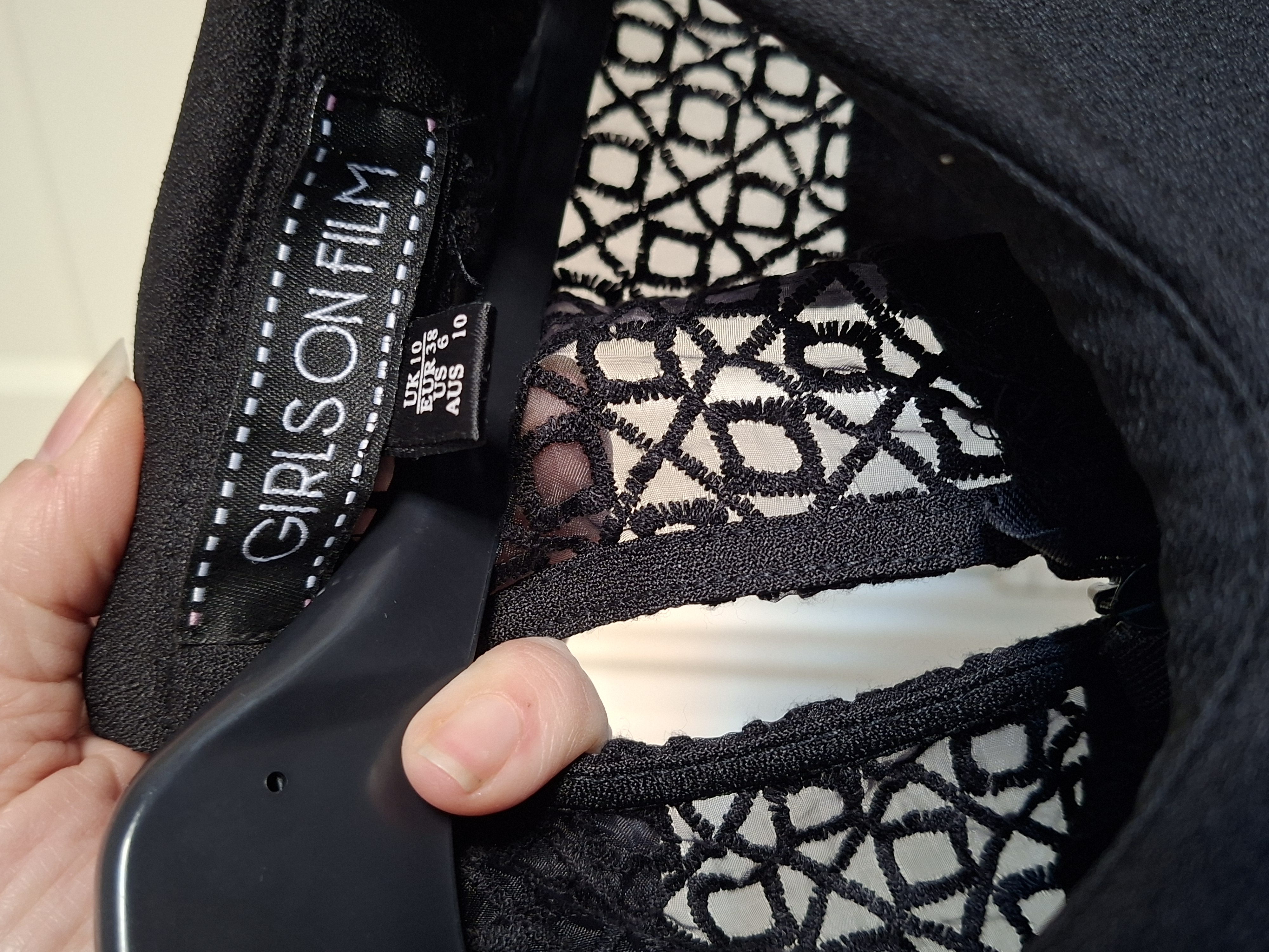 Girls on Film zwarte jumpsuit met kant maat 38 (52.)