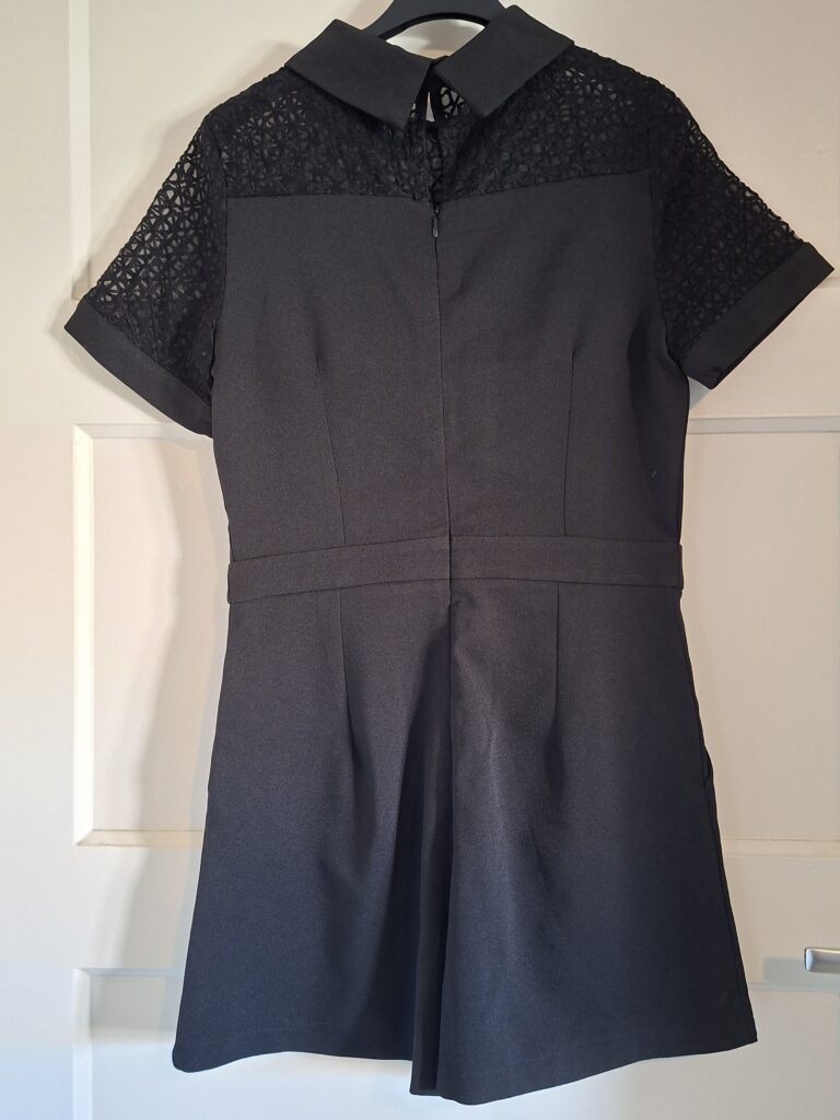 Girls on Film zwarte jumpsuit met kant maat 38 (52.)