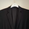 Zwarte wat langere blazer maat S