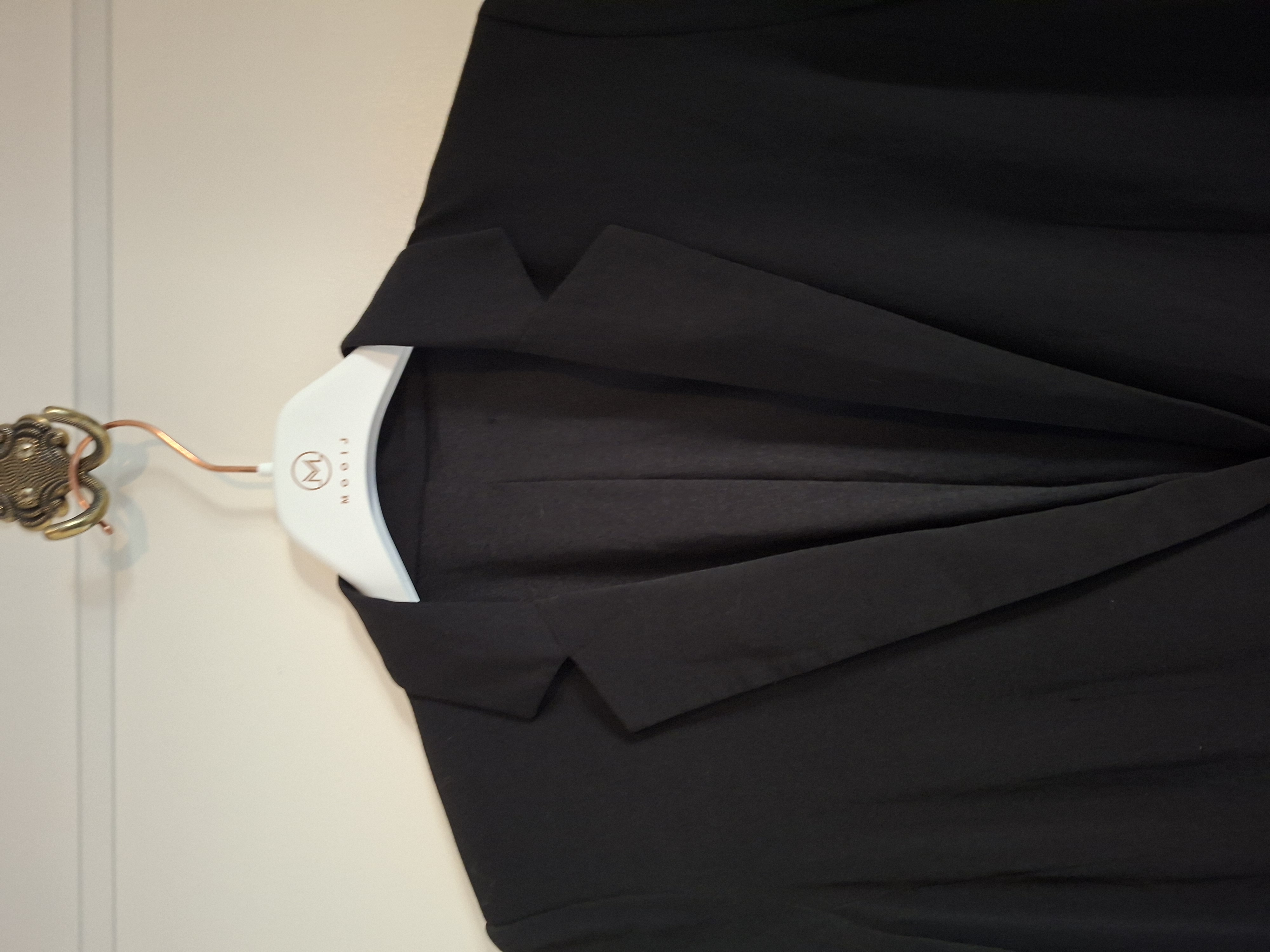 Zwarte wat langere blazer maat S