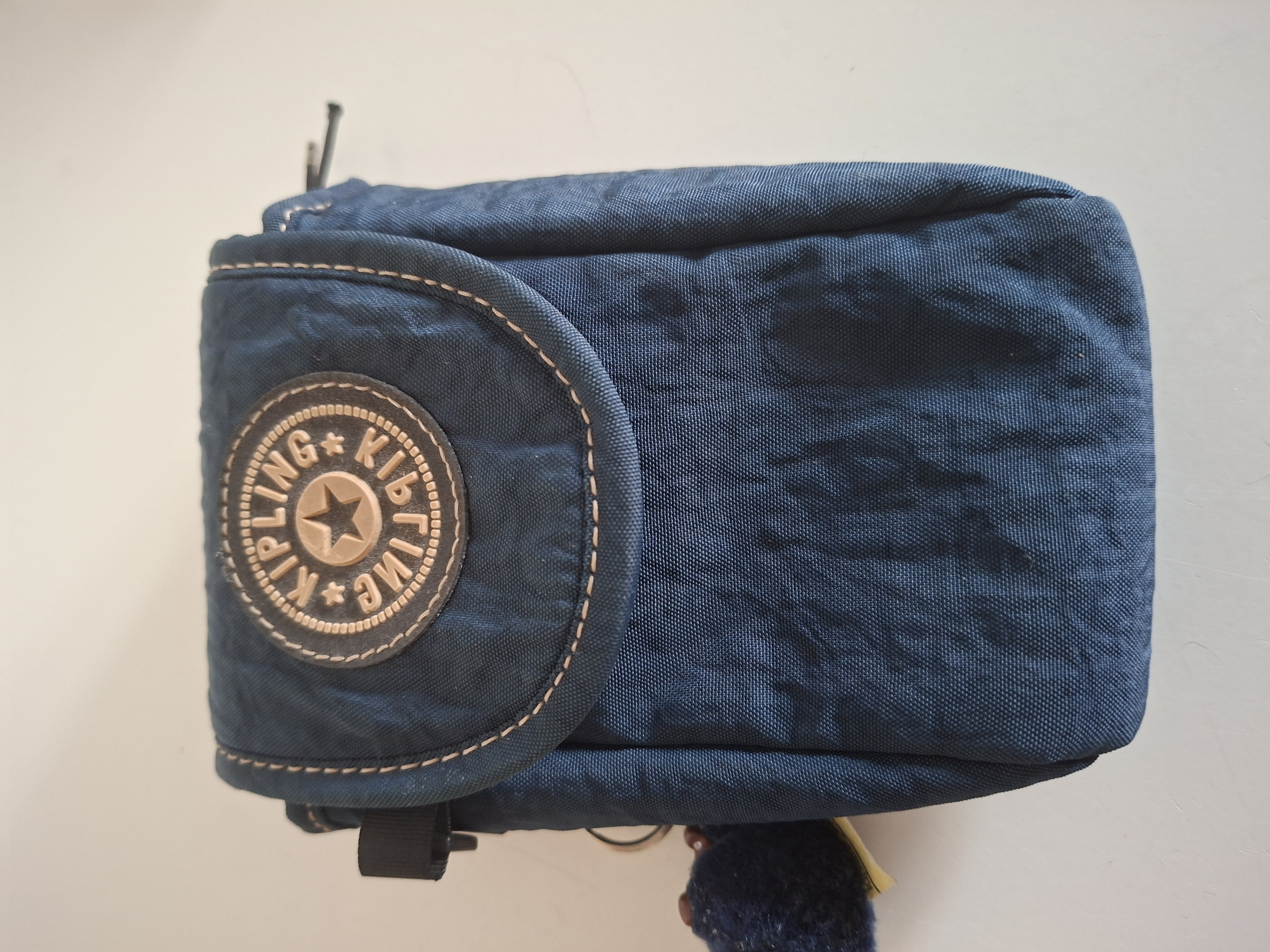 Kipling schoudertasje donkerblauw met aapje