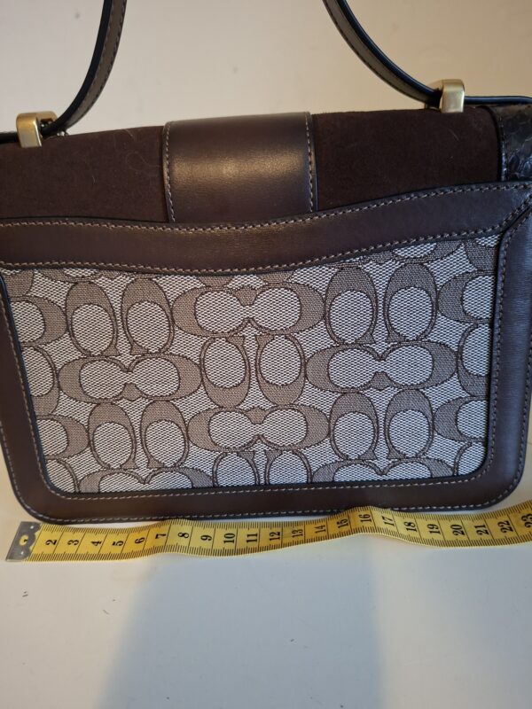 20260219_093513 Coach signature canvas schoudertas