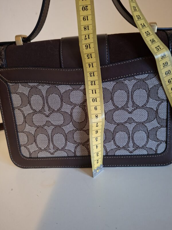 20260219_093523 Coach signature canvas schoudertas