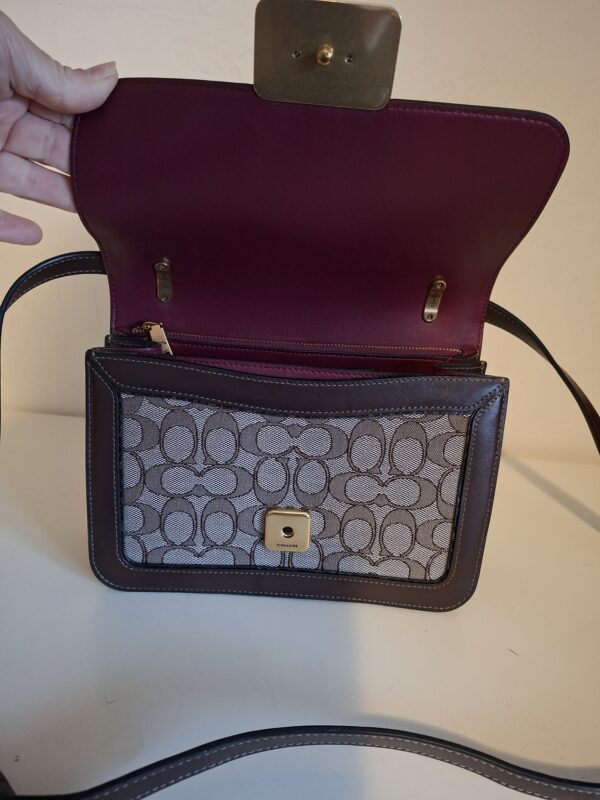 20260219_093605 Coach signature canvas schoudertas