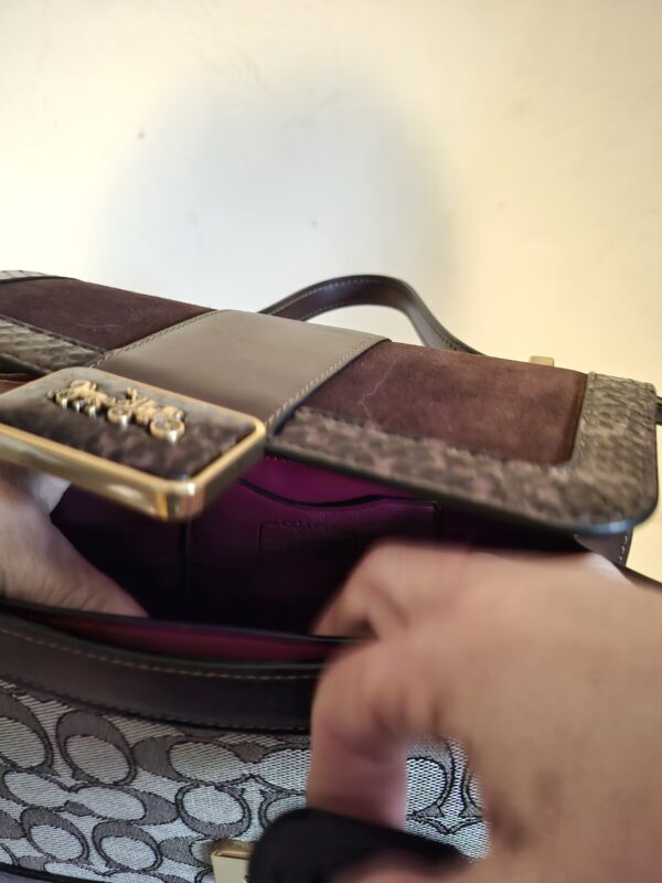 20260219_093621 Coach signature canvas schoudertas