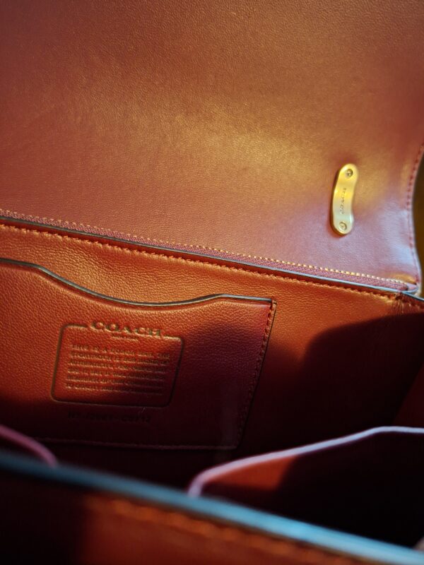 20260219_093648 Coach signature canvas schoudertas