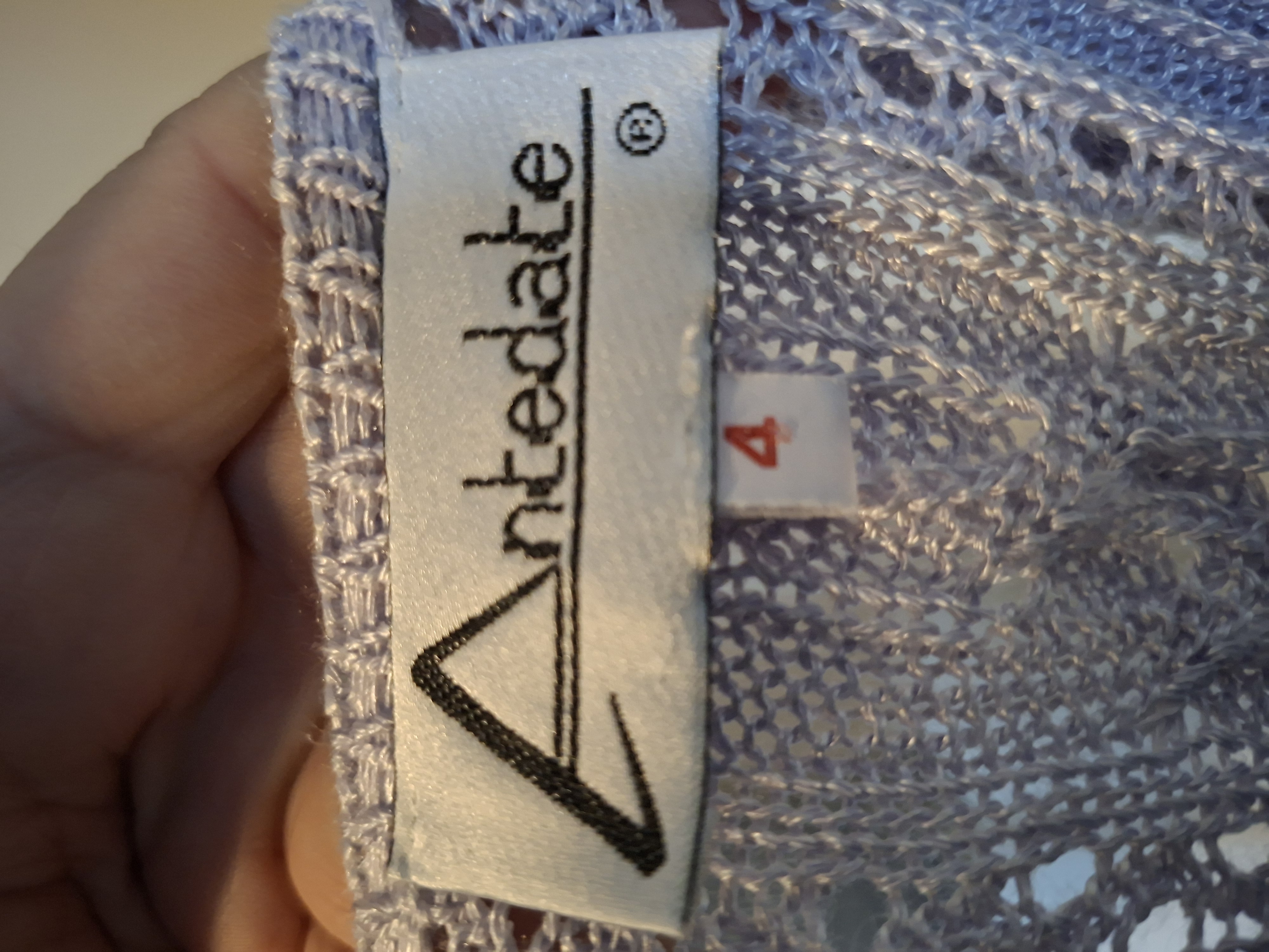 20260222_110549 Antedate gebreide trui met kabel- en ajour patroon - Lila