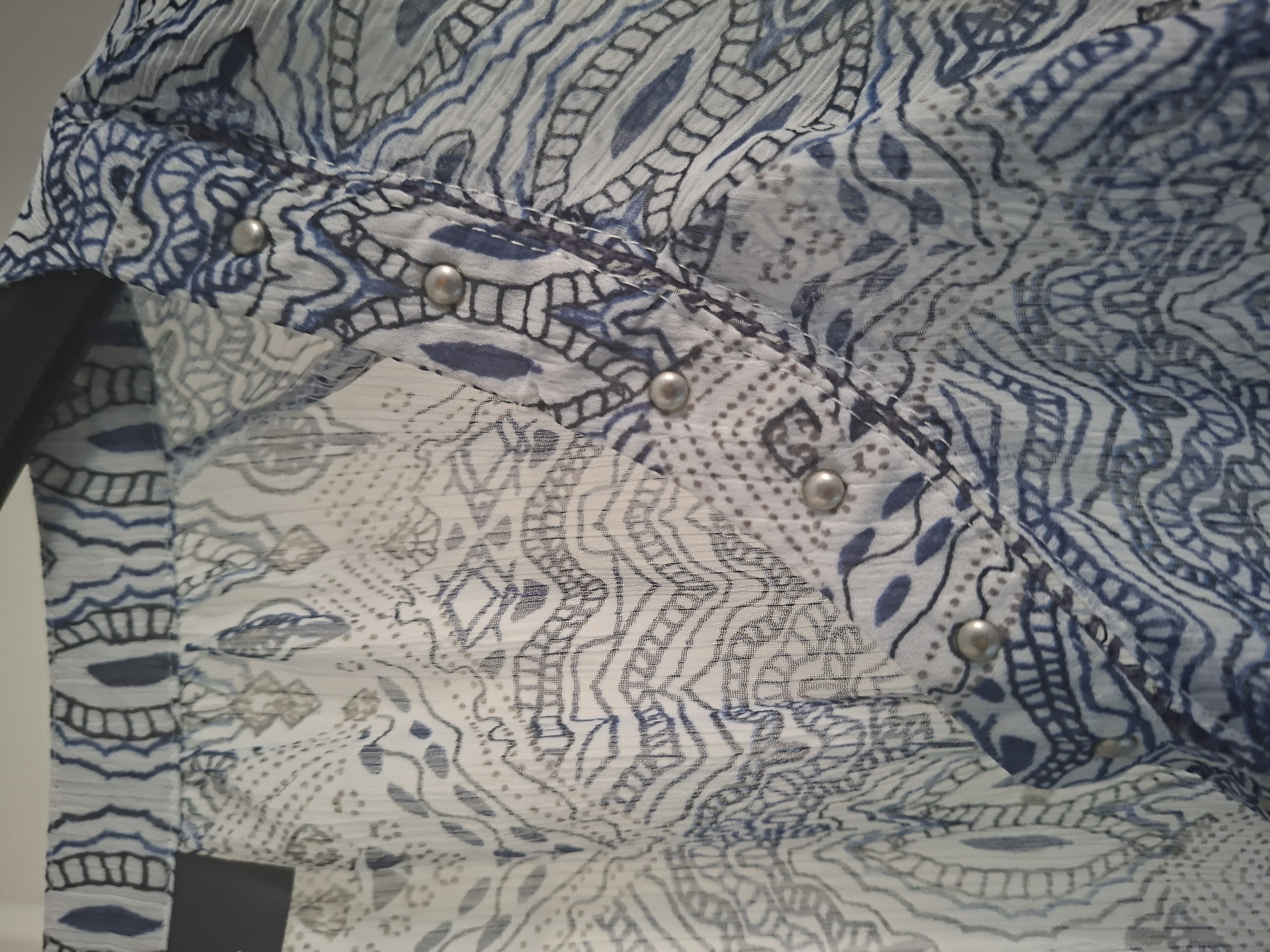 20260226_110800 Yessica blouse met blauwe print maat M