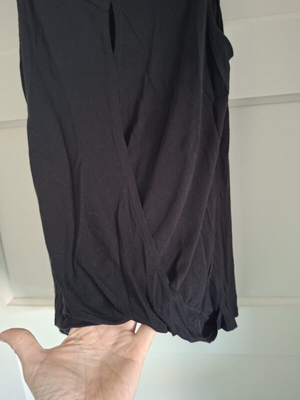 Zwart mouwloos topje tuniek met drapering en uitsnijding maat M/L