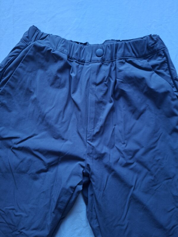 Uniqlo gewateerde winterbroek donkergrijs maat 122-128