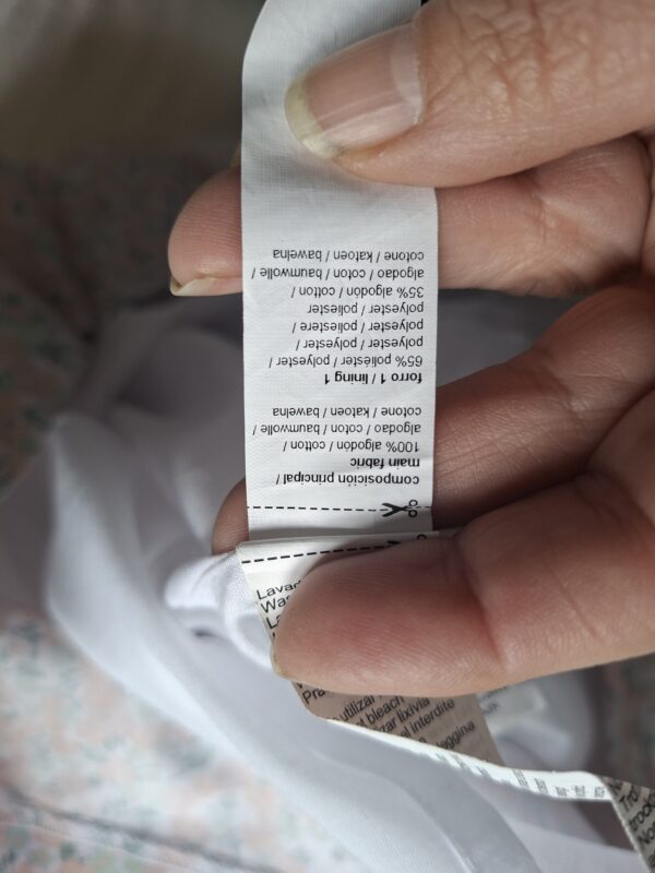 Gocco jurk met bloemenprint en groen smockwerk maat 86/92