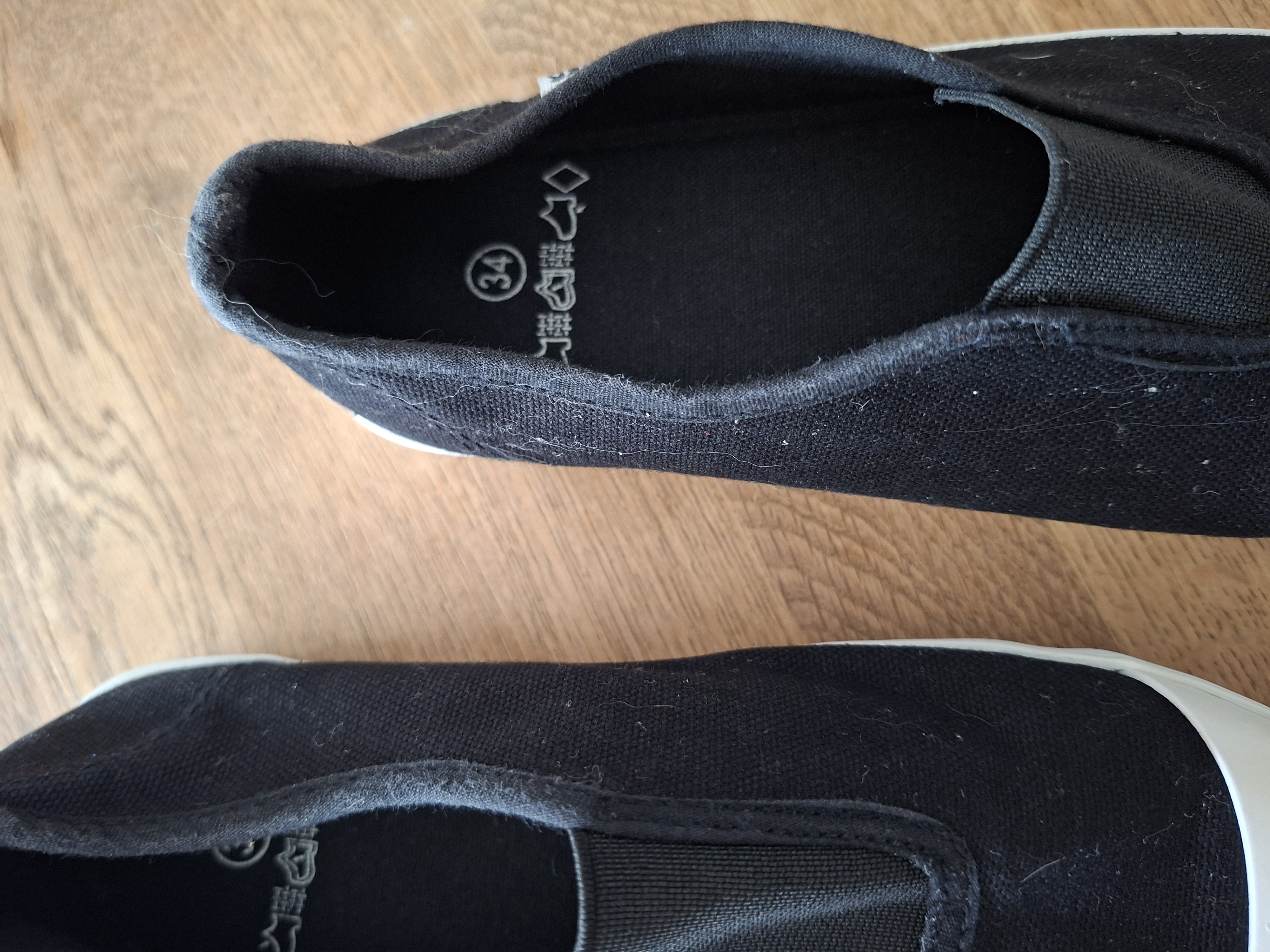 Panther slip-on sneakers zwart canvas maat 34