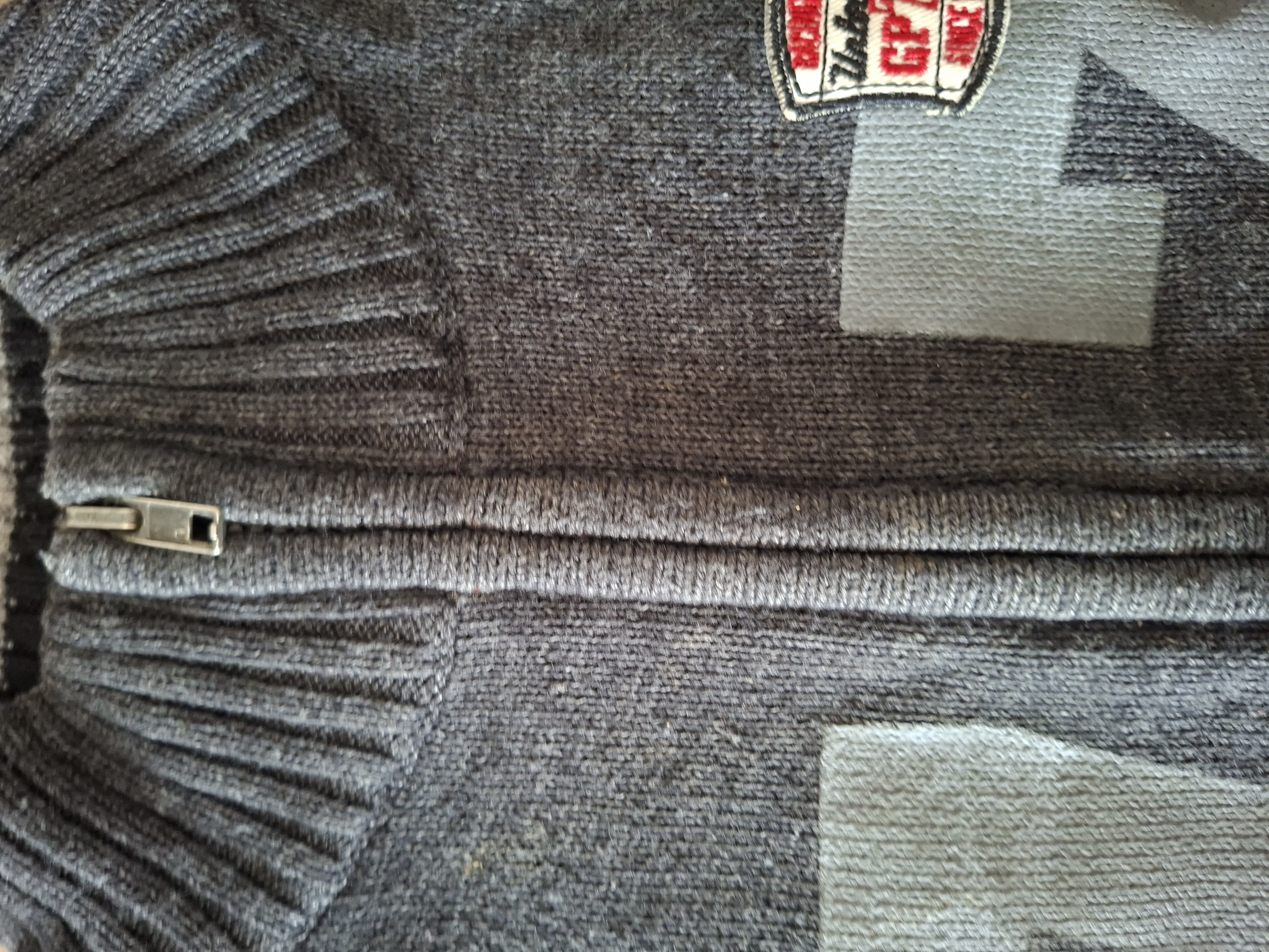 Unlocked gebreide vest grijs GP73 jongens maat 116/122