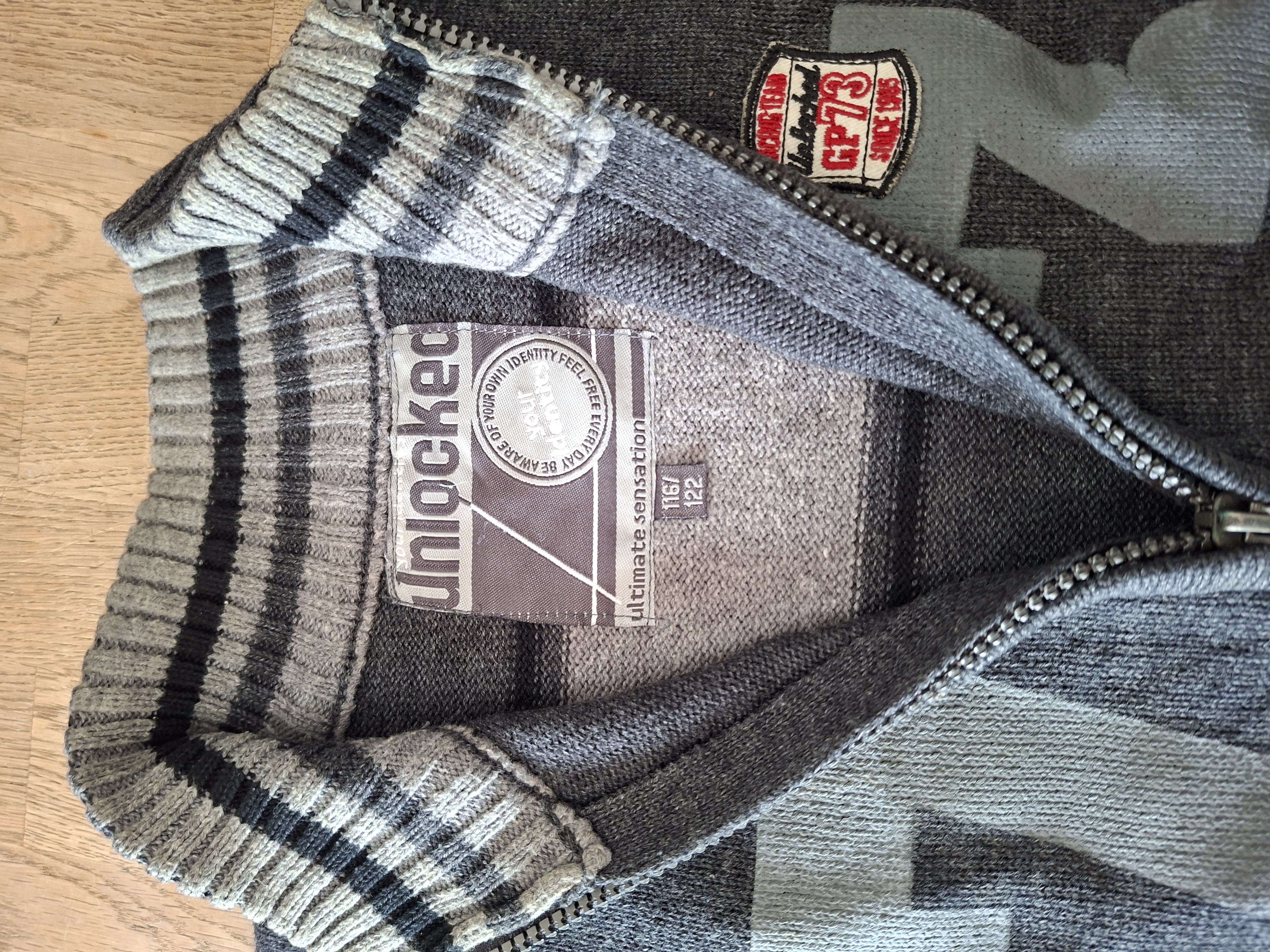 Unlocked gebreide vest grijs GP73 jongens maat 116/122