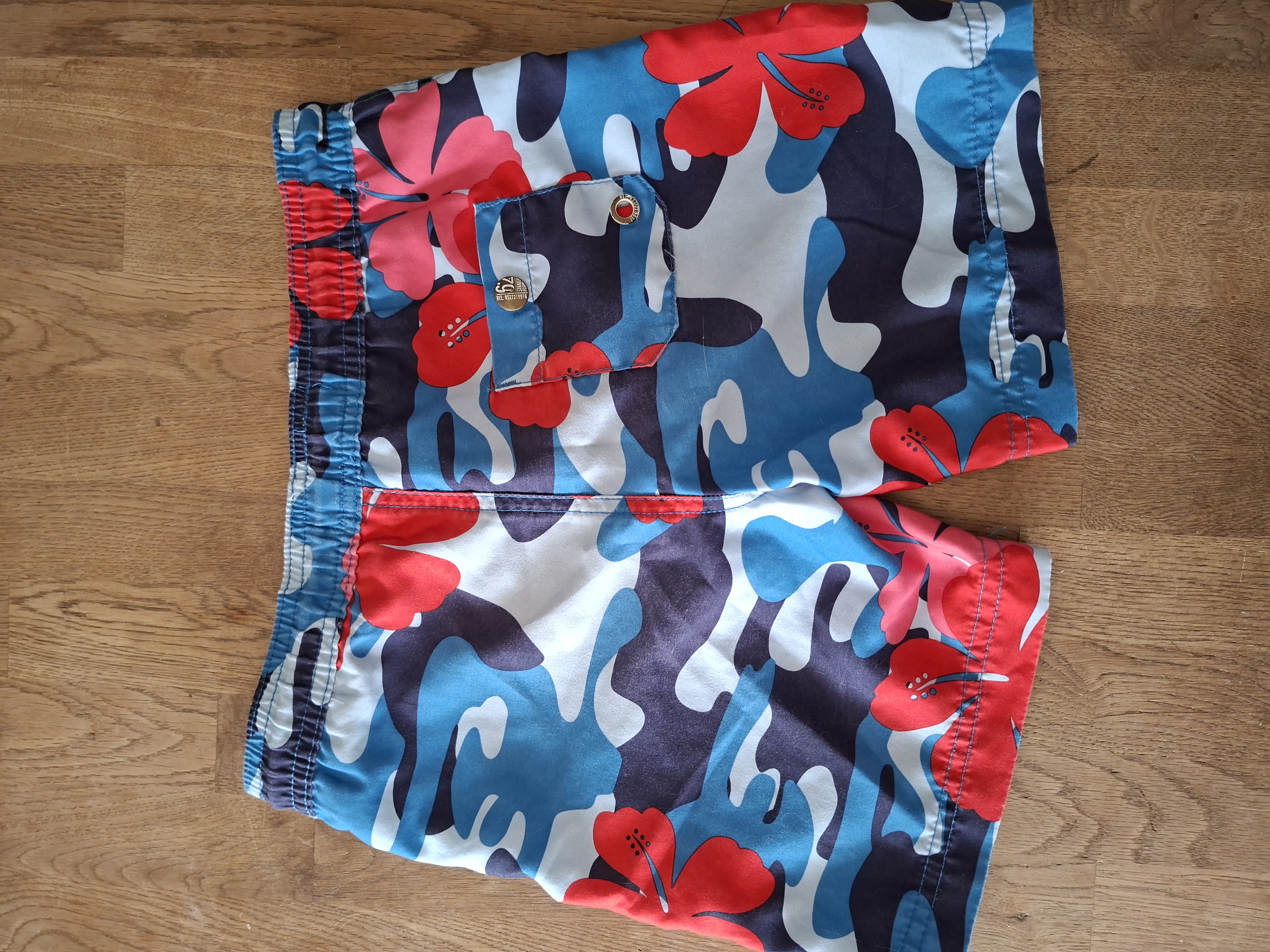 WE Fashion zwembroek blauw hibiscus print