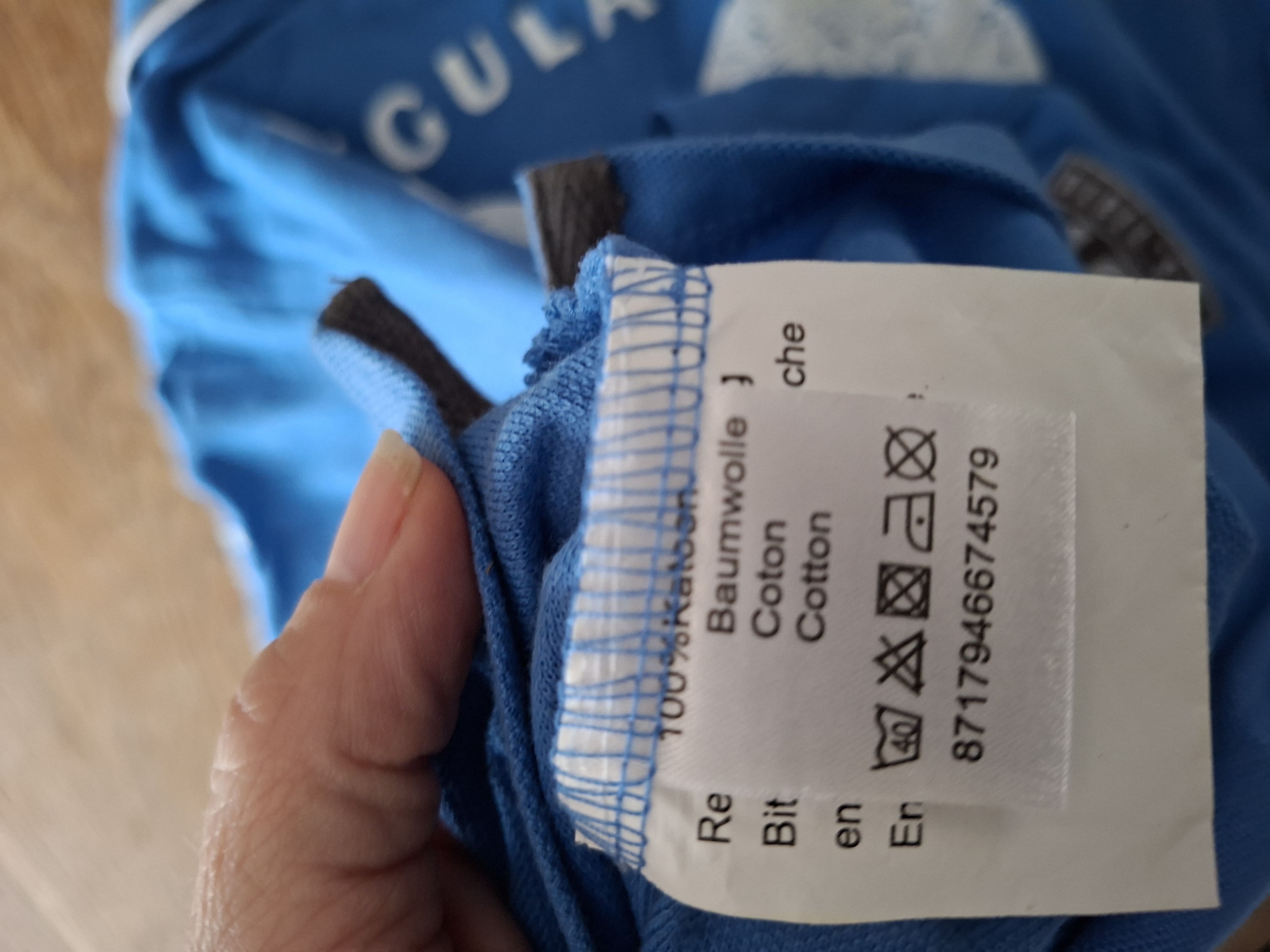 New Basic poloshirt kobaltblauw met prints en patches