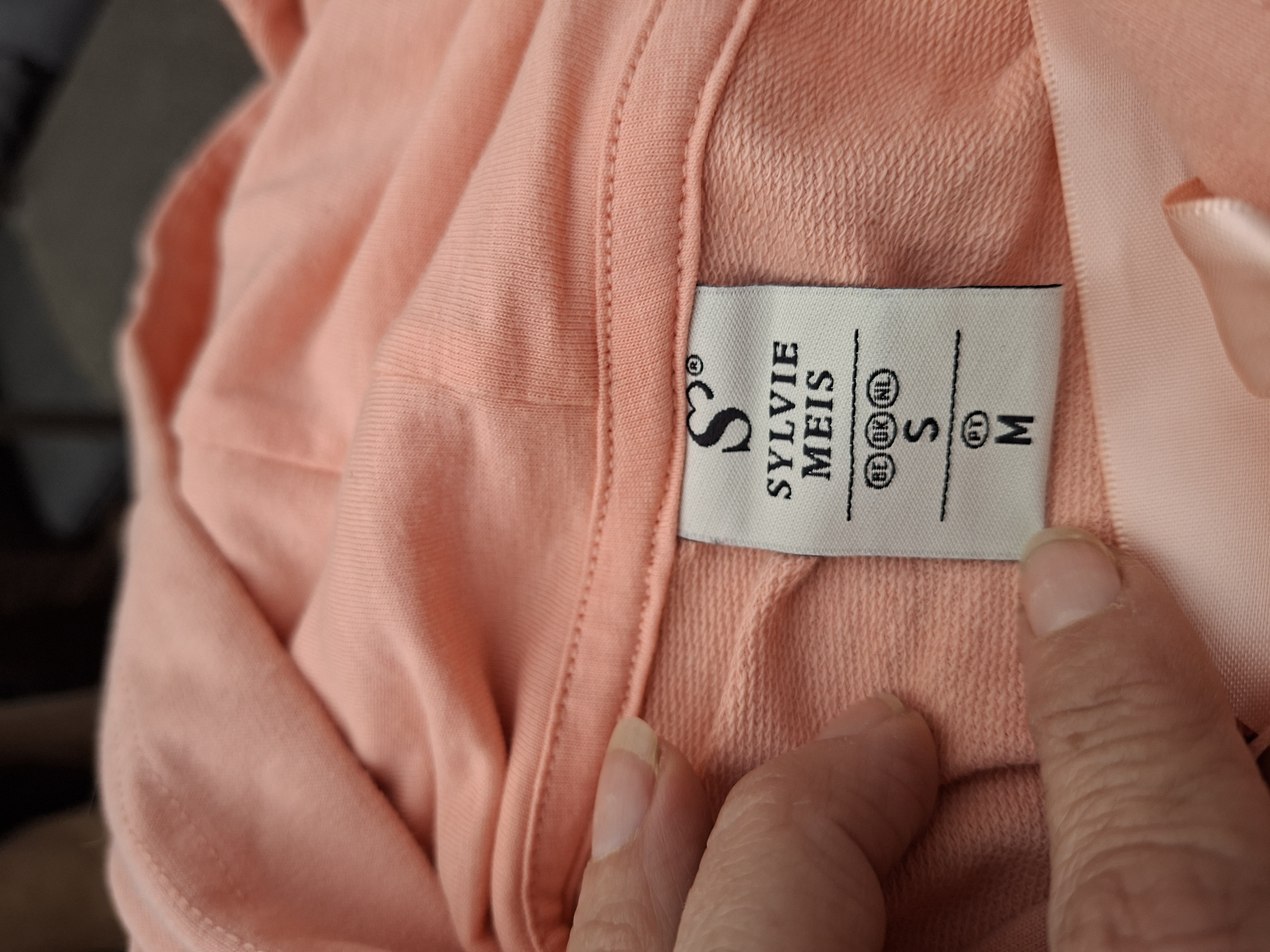 20260408_152159 Sylvie Meis cropped hoodie perzikroze met satijnen lint