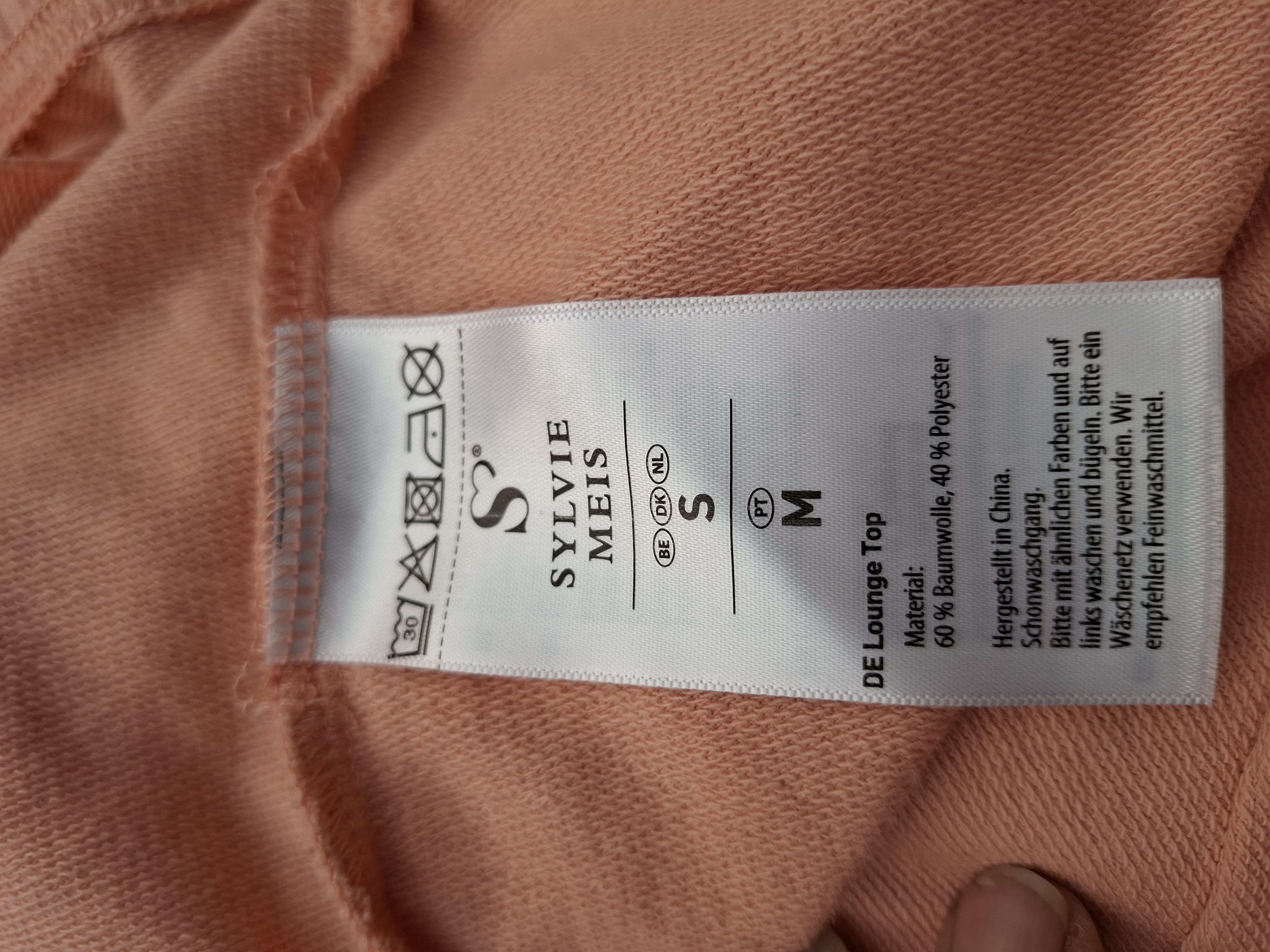 20260408_152211 Sylvie Meis cropped hoodie perzikroze met satijnen lint