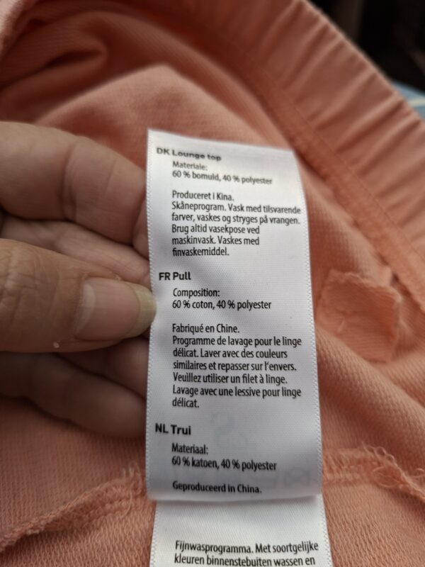 20260408_152220 Sylvie Meis cropped hoodie perzikroze met satijnen lint