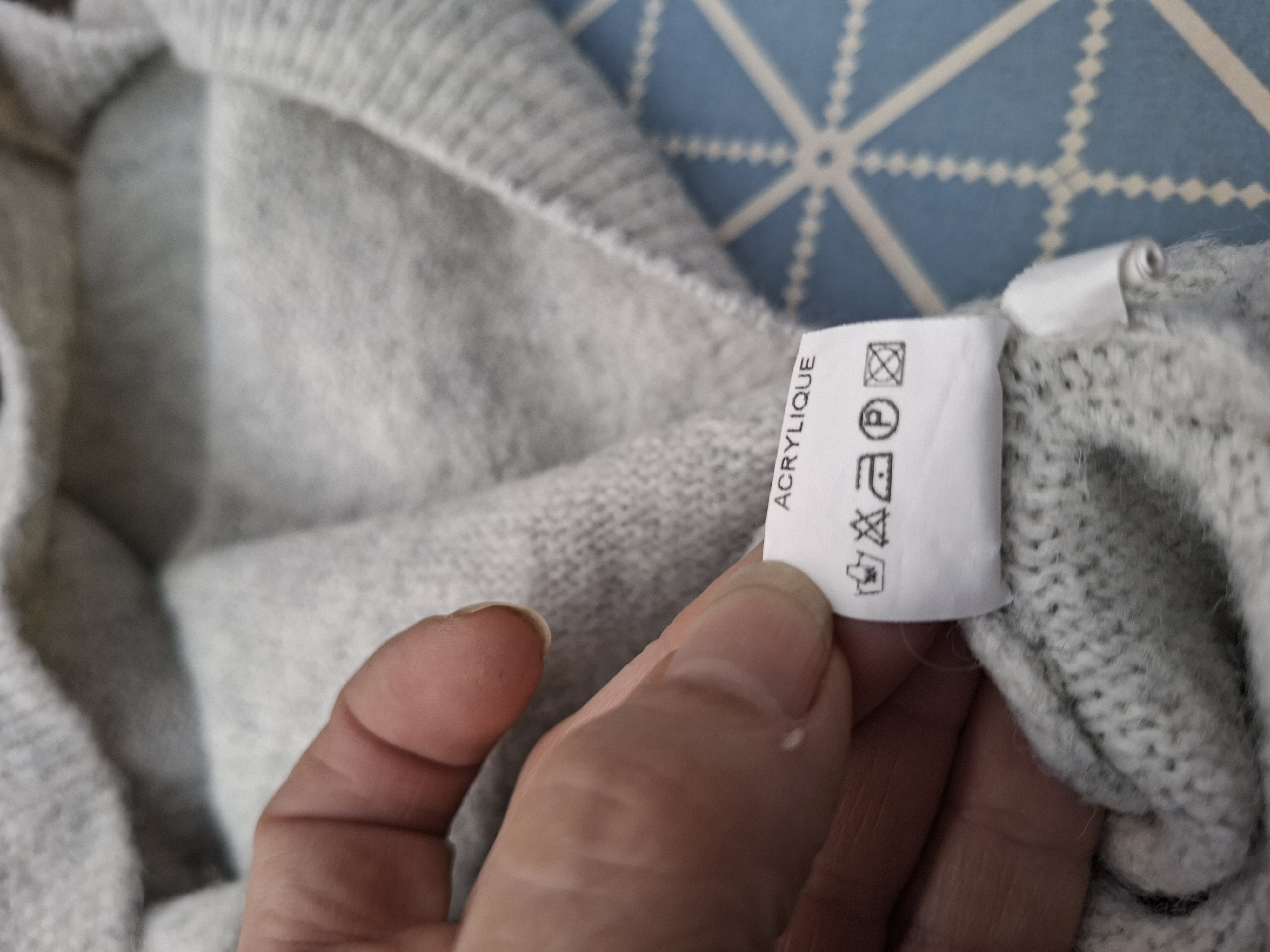 Peace & Love trui crème met openrug en strikken