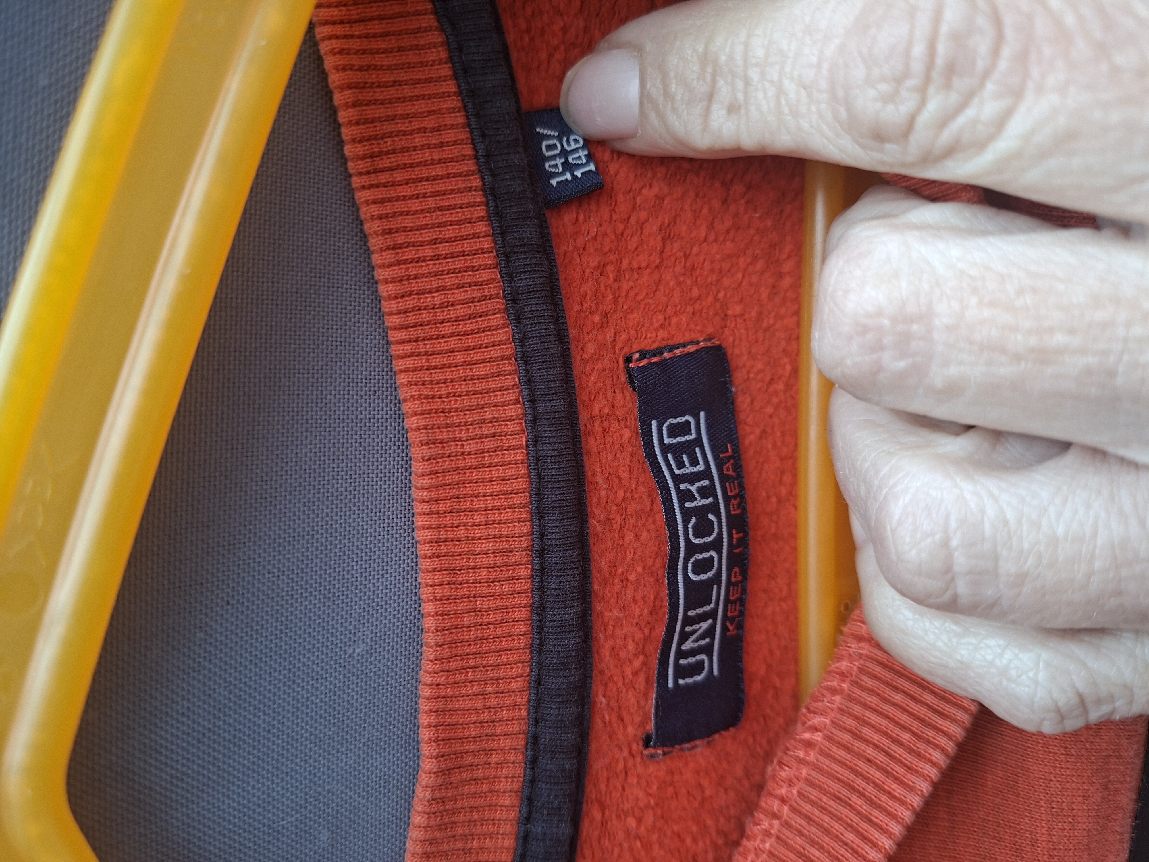 Unlocked "No rules" sweater oranje met streepdetail