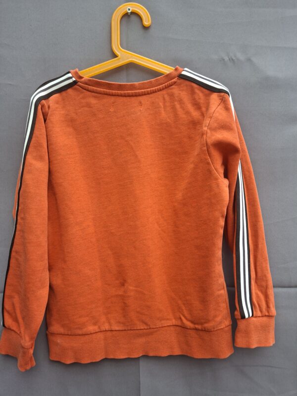Unlocked "No rules" sweater oranje met streepdetail