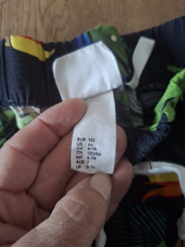 H&M x Dieter Braun short donkerblauw tropische vogels maat 122 nette staat