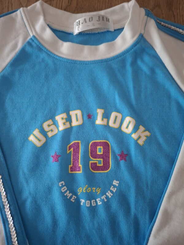 Hao Jiu longsleeve blauw wit "Used Look 19" met pailletten maat 5 nette staat