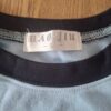 Hao Jiu longsleeve lichtblauw "Makerasion 8 Boss" pailletten maat 8 jaar nette staat