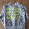 20260418_165523 Dirkje Boys cardigan grijs "N.W. International Air Routes" maat 68 nette staat