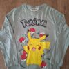 Pokémon longsleeve mintgroen Pikachu maat 128 nette staat
