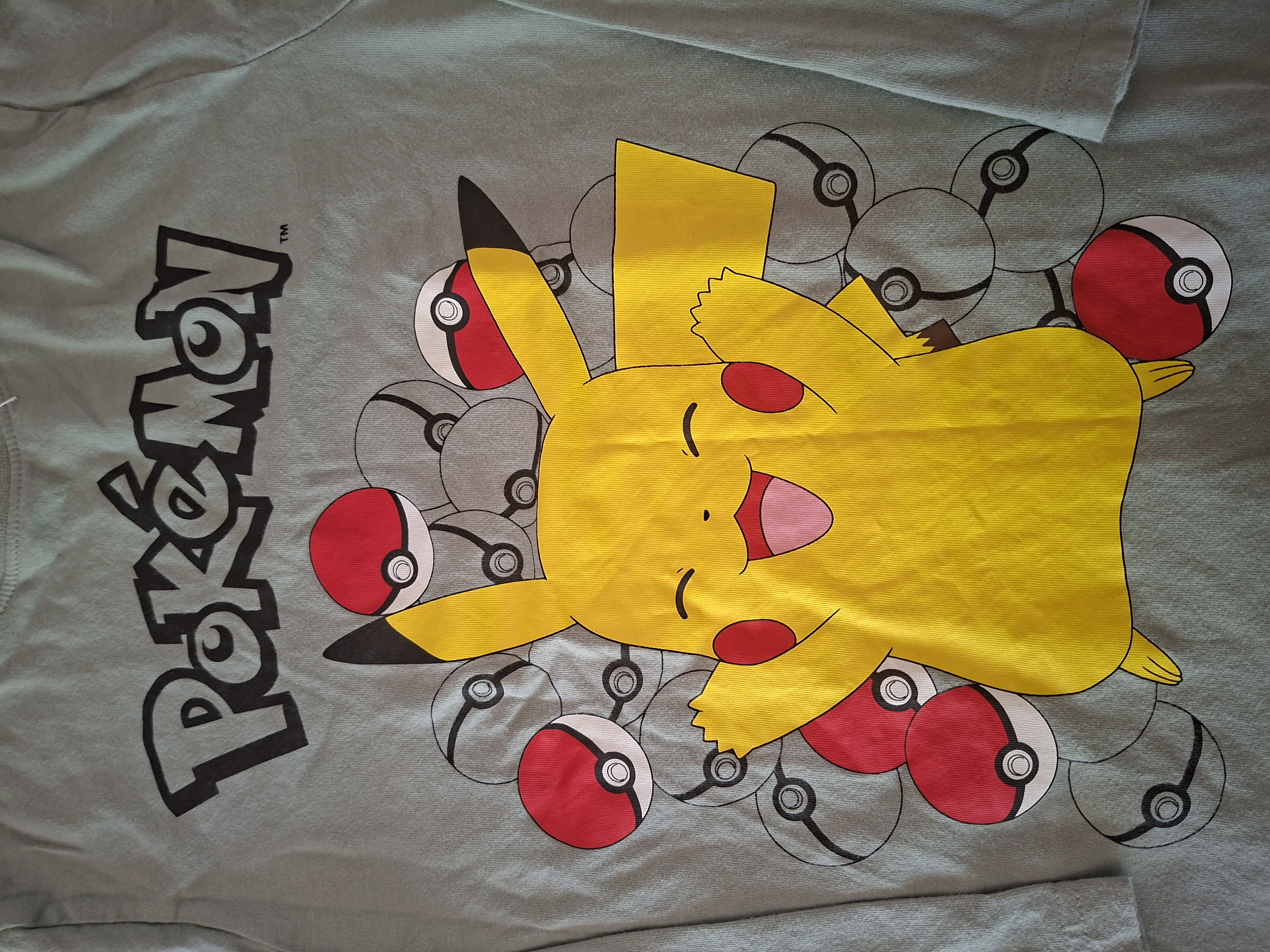 Pokémon longsleeve mintgroen Pikachu maat 128 nette staat