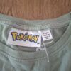 Pokémon longsleeve mintgroen Pikachu maat 128 nette staat