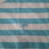 20260502_115628 El Corte Inglés Kids crop top turquoise gestreept palmboom maat 110 nette staat