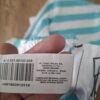 20260502_115704 El Corte Inglés Kids crop top turquoise gestreept palmboom maat 110 nette staat