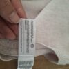 Palomino (C&A) gebreide cardigan ecru pofmouwen bloem maat 98 nette staat