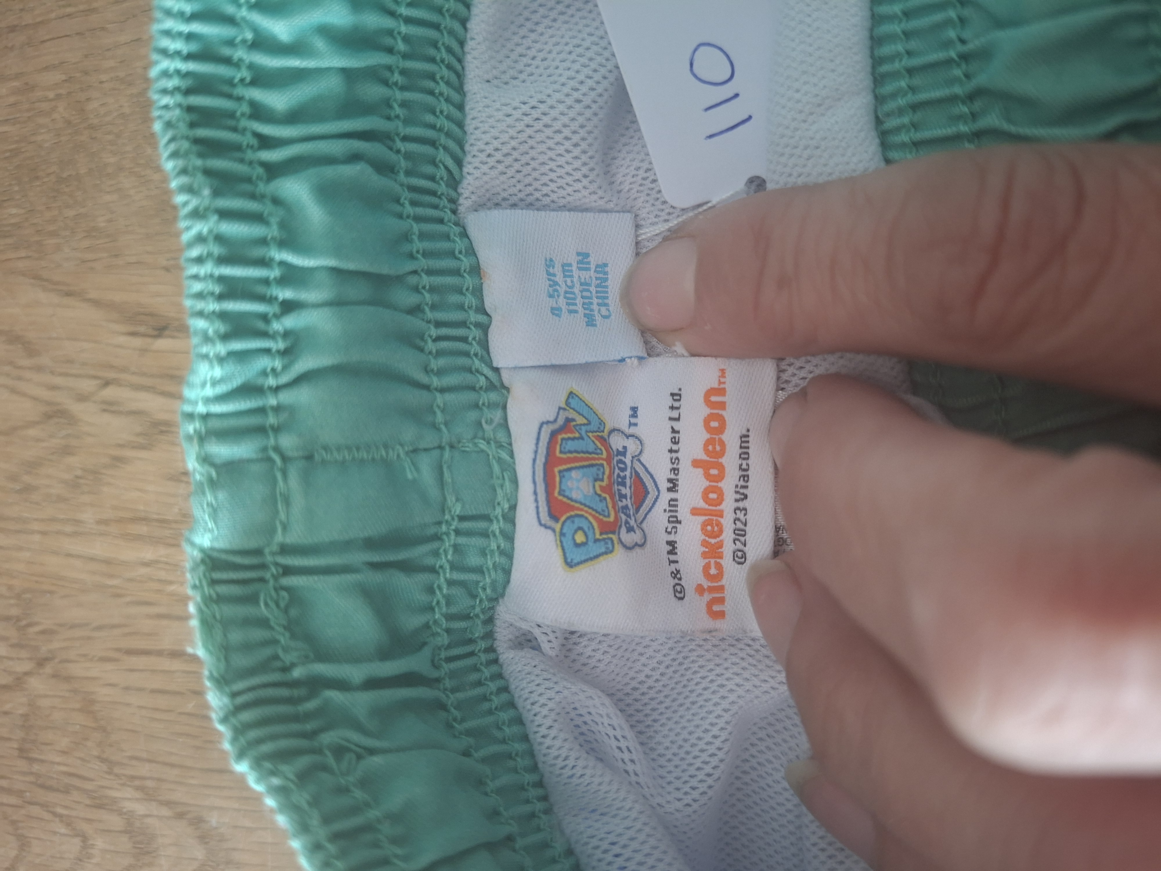 20260506_160459 Paw Patrol kleurrijke zwembroek maat 110