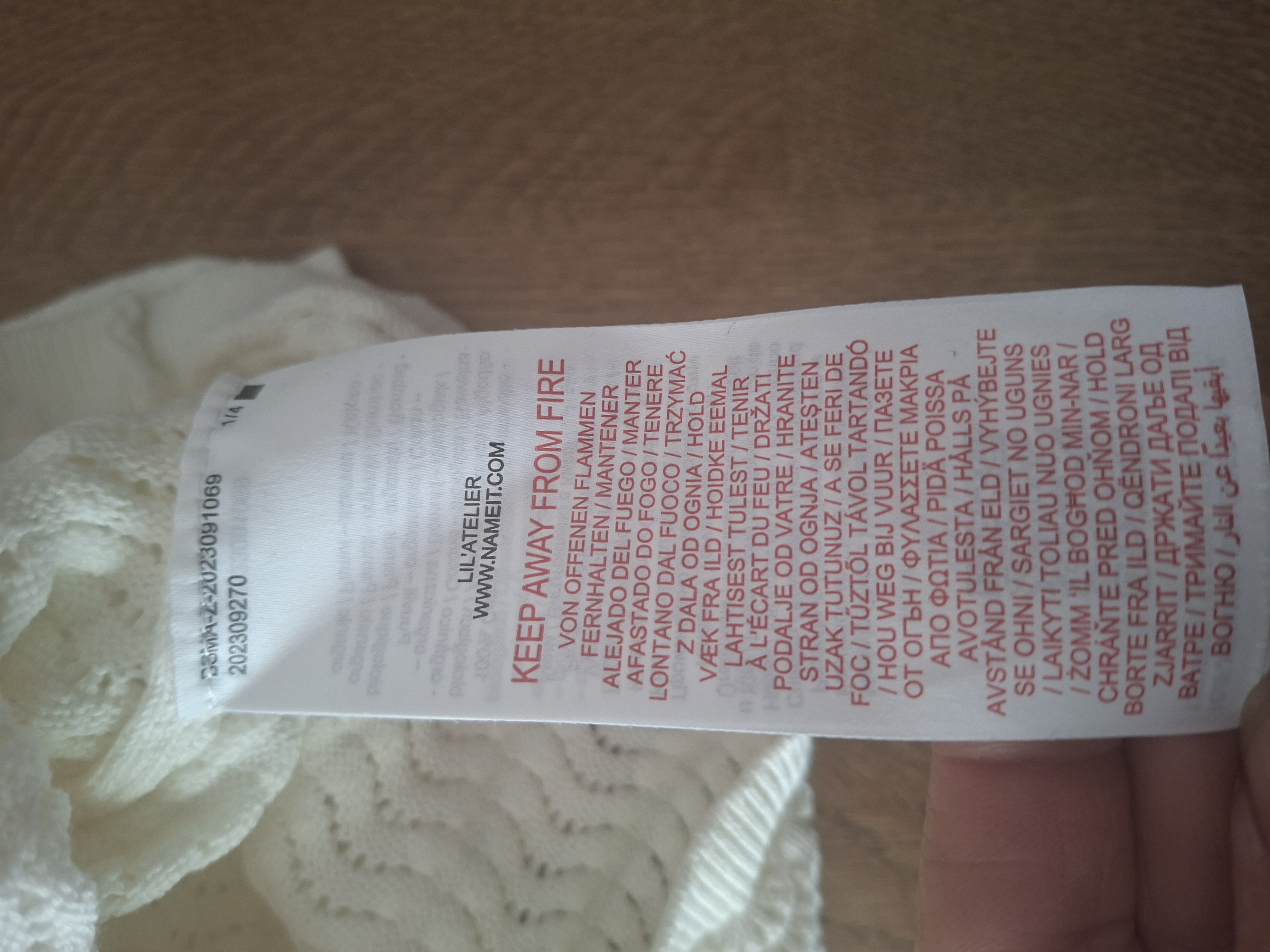 20260506_162840 Lil'Atelier gebreide trui korte mouw off-white ajour maat 104
