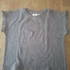 20260506_164306 Zara gebreid topje grijs waffle-knit ruche mouwen maat 98