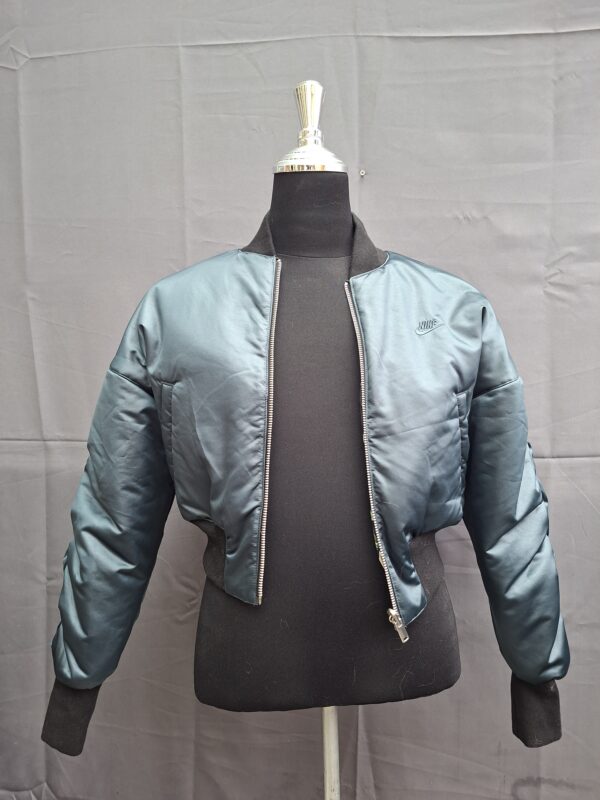20260517_180219 Nike Sportswear reversible windrunner jack zwart/teal maat S