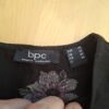 bpc bonprix collection midi-jurk zwart met bloemenprint