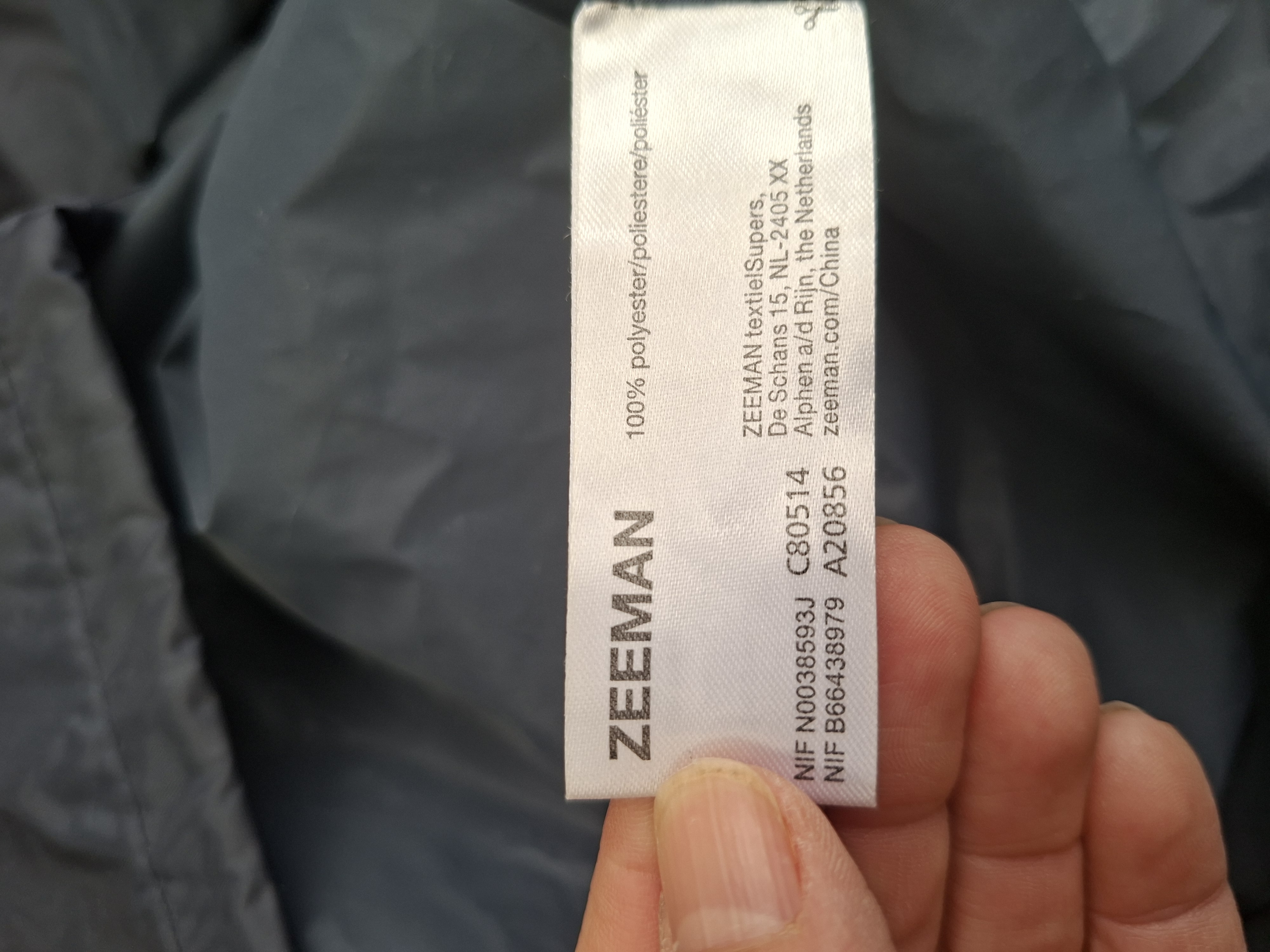 Zeeman regenjas donkerblauw met reflectiestreep