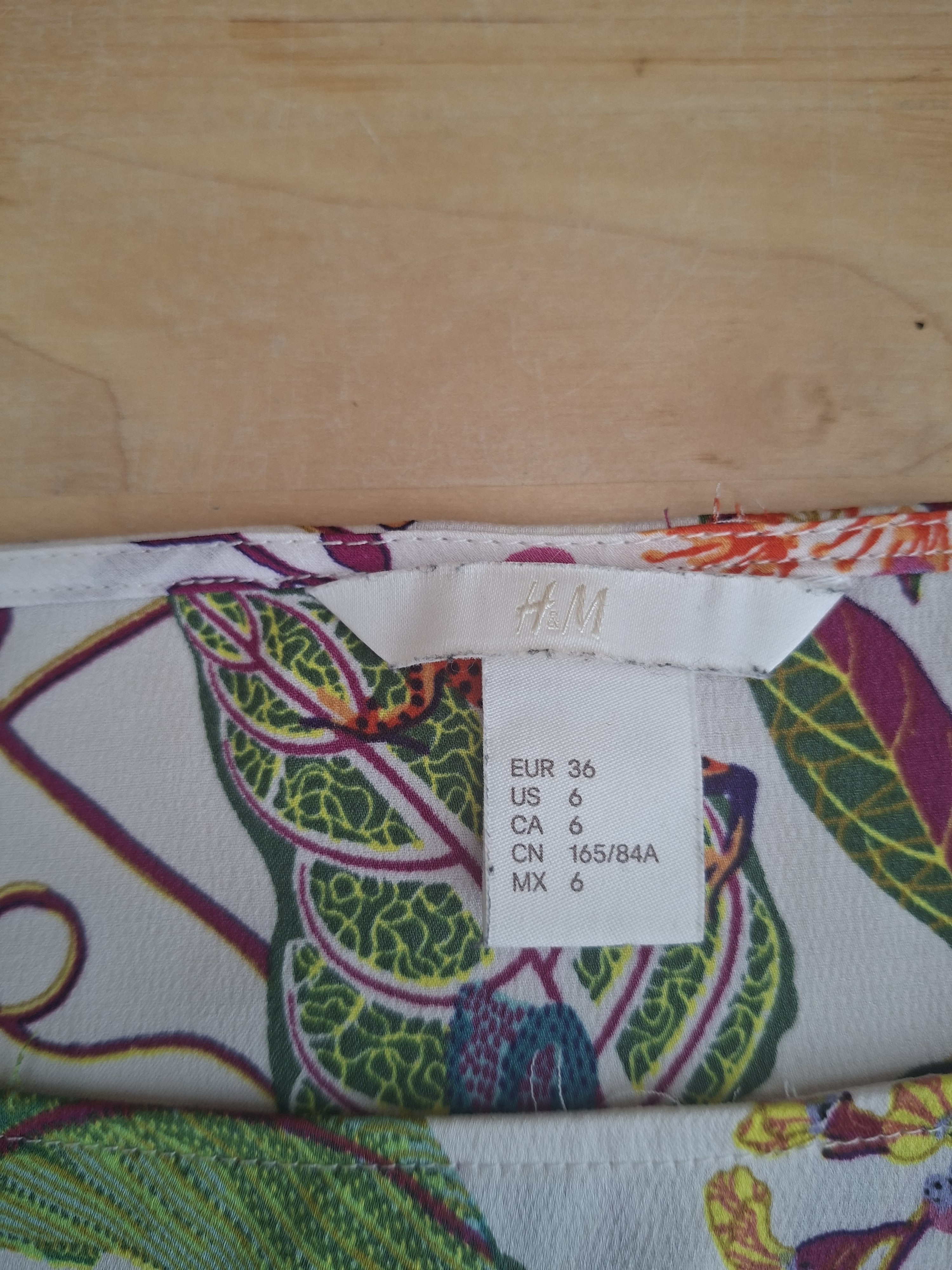 H&M blouse wit met tropische print en dubbele volantmouwen maat 36