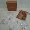 20260610_163808 Gnoce Jewelry sieraden set 6 bedels en ketting, zilverkleurig