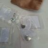 20260610_163817 Gnoce Jewelry sieraden set 6 bedels en ketting, zilverkleurig