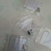 20260610_163820 Gnoce Jewelry sieraden set 6 bedels en ketting, zilverkleurig